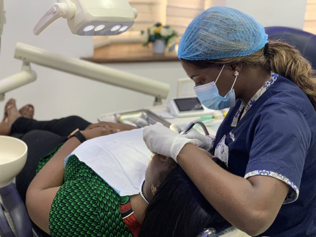 smilesdotcom doctor working on patient